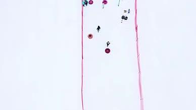 4K航拍冬季滑雪场溜冰场游客旅游玩雪娱乐视频的预览图